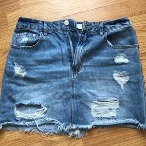 Denim skirt with fringe